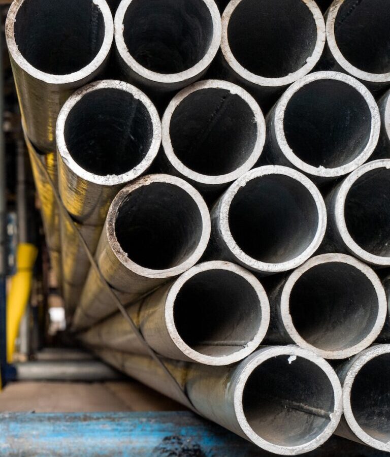 gray plastic cups on wooden table