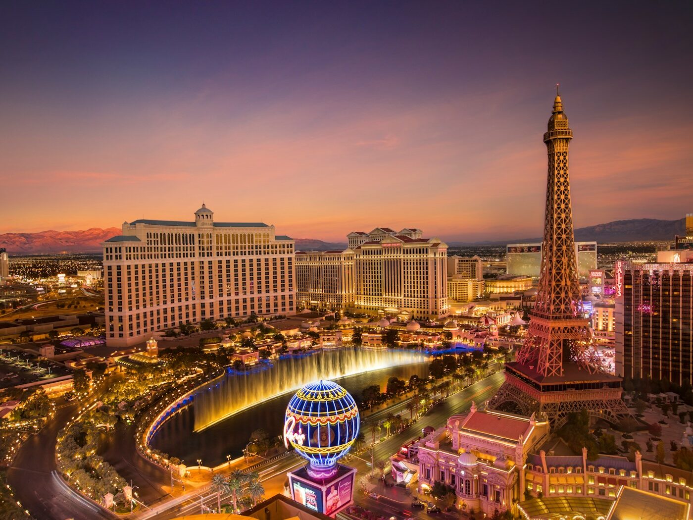 city with lights turned on during night time