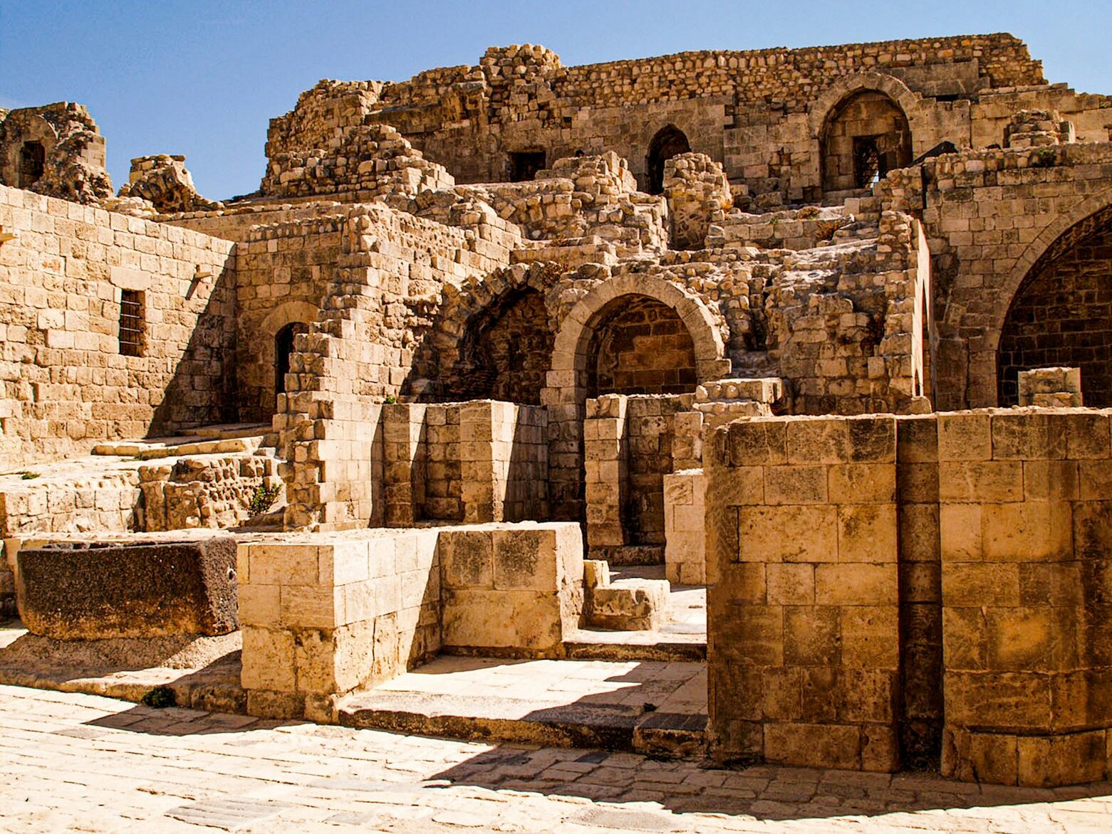 brown concrete building under blue sky during daytime